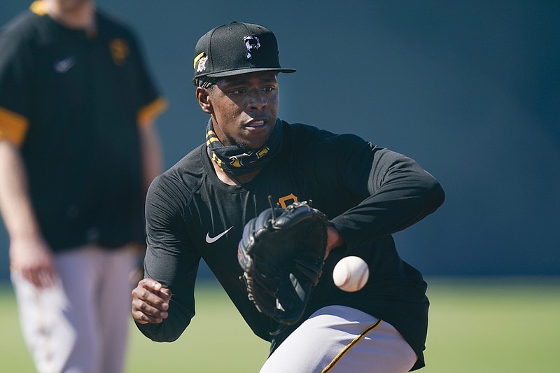 Pittsburgh Pirates' Ke'Bryan Hayes takes part in a drill during a spring training baseball workout Thursday, Feb. 25, 2021, in Bradenton, Fla. (AP Photo/Frank Franklin II)