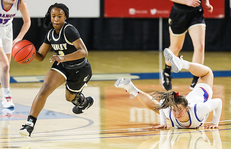 Staff photo by Troy Stolt / Bradley Central guard Jamia Williams, left, sprints downcourt after stealing the basketball from Lebanon during a TSSAA Class AAA state quarterfinal Thursday afternoon in Murfreesboro.