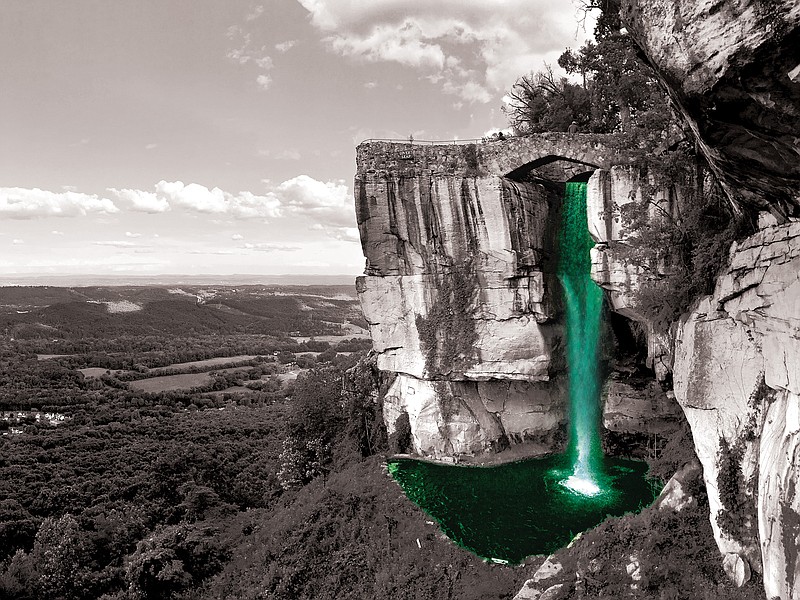 Photo from See Rock City / Rock City turns its iconic waterfall green for Shamrock City, its St. Patrick's Day festival.