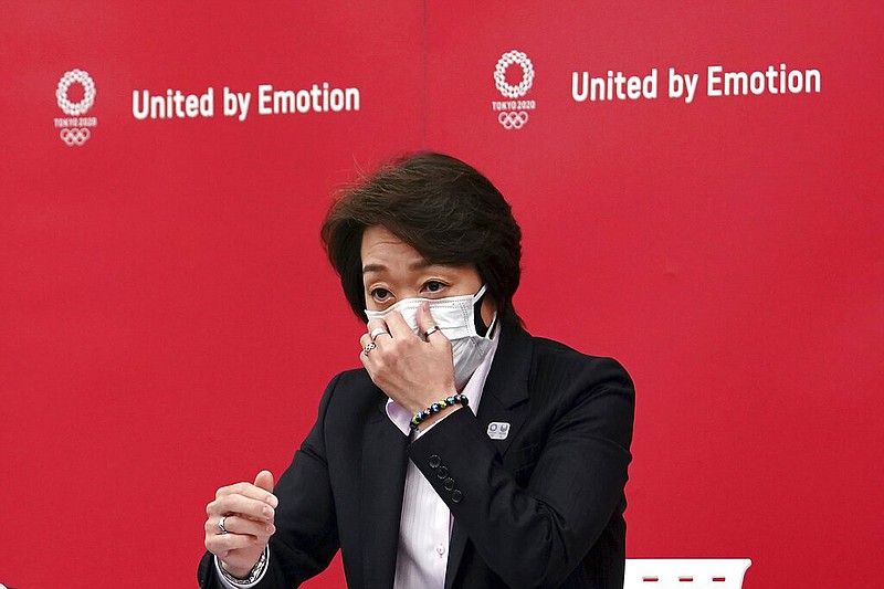 Seiko Hashimoto, president of the Tokyo 2020 Organizing Committee of the Olympic and Paralympic Games (Tokyo 2020), speaks during a news conference Thursday, March 11, 2021, after attending the International Olympic Committee (IOC) general meeting. (AP Photo/Eugene Hoshiko, Pool)