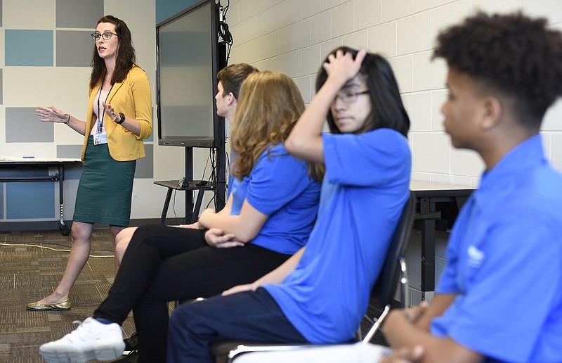 Staff File Photo By Robin Rudd/ Red Bank High school STEM teacher Olivia Bagby introduces students for a 2019 panel discussion.