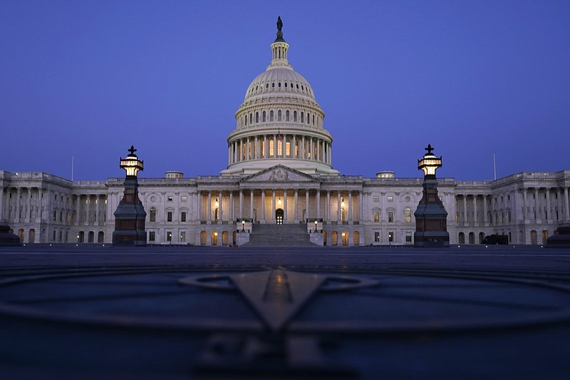 FILE - In this March 5, 2021, file photo The Capitol is seen just before sunrise in Washington. The state across the South are the center of the upcoming once-a-decade redistricting battle. The region is the fastest-growing in the country and as a result will be adding an estimated half-a-dozen House seats. (AP Photo/Carolyn Kaster, File)