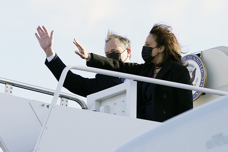 Vice President Kamala Harris and her husband, Doug Emhoff, wave as they board Air Force Two at Andrews Air Force Base, Md., Monday, March 15, 2021, en route to Las Vegas. President Joe Biden, Vice President Kamala Harris and their spouses are opening an ambitious, cross-country tour to highlight the $1.9 trillion coronavirus relief plan and its benefits. (AP Photo/Jacquelyn Martin)