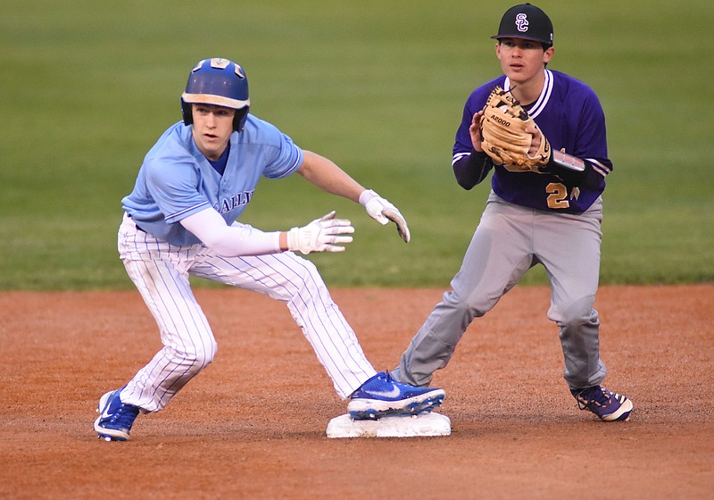 Staff Photo by Matt Hamilton / McCallie (2) Jaden Copeland and Sequatchie County (24) Daniel Rogers wait for the call on a steal at second at McCallie School on Tuesday, March 16, 2021. 