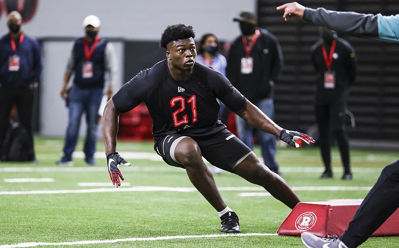 Georgia photo by Tony Walsh / Former Georgia outside linebacker Azeez Ojulari, a projected first-round pick in the 2021 NFL draft, goes through drills Wednesday during pro day in Athens.