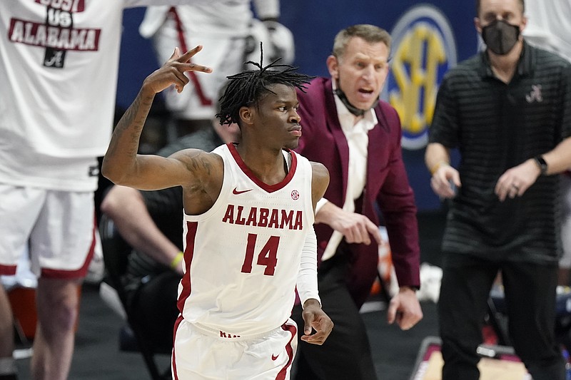 AP photo by Mark Humphrey / Alabama's Keon Ellis celebrates after scoring against LSU during the SEC tournament championship game Sunday in Nashville. The Crimson Tide swept the league's regular-season and tourney titles and received a No. 2 seed for the NCAA bracket.