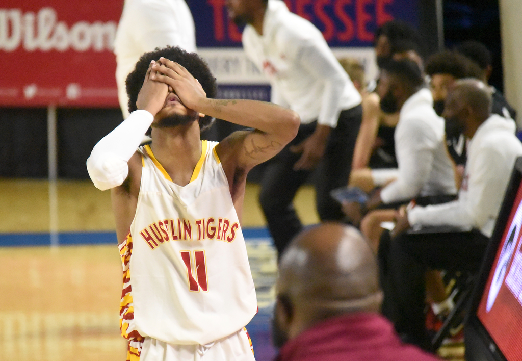 Staff photo by Matt Hamilton / Howard's Xavier Fisher reacts as the final seconds tick off the clock during the Hustlin Tigers' TSSAA Class AA state quarterfinal against Jackson Southside on Thursday in Murfreesboro.