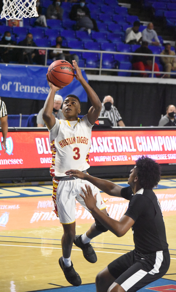 Staff Photo by Matt Hamilton / Howard's (3) Jacobi Dixon puts up a shot at the Murphy Center in Murfreesboro on Thursday, March 18, 2021.