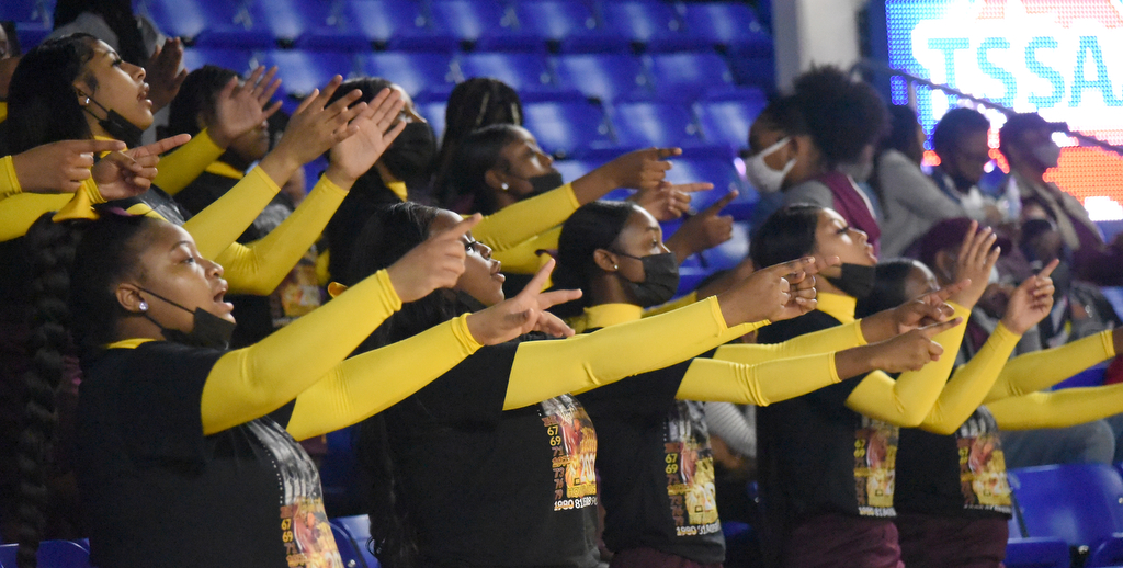 Staff Photo by Matt Hamilton / Howard cheerleaders root for the Hustlin' Tigers at the Murphy Center in Murfreesboro on Thursday, March 18, 2021.