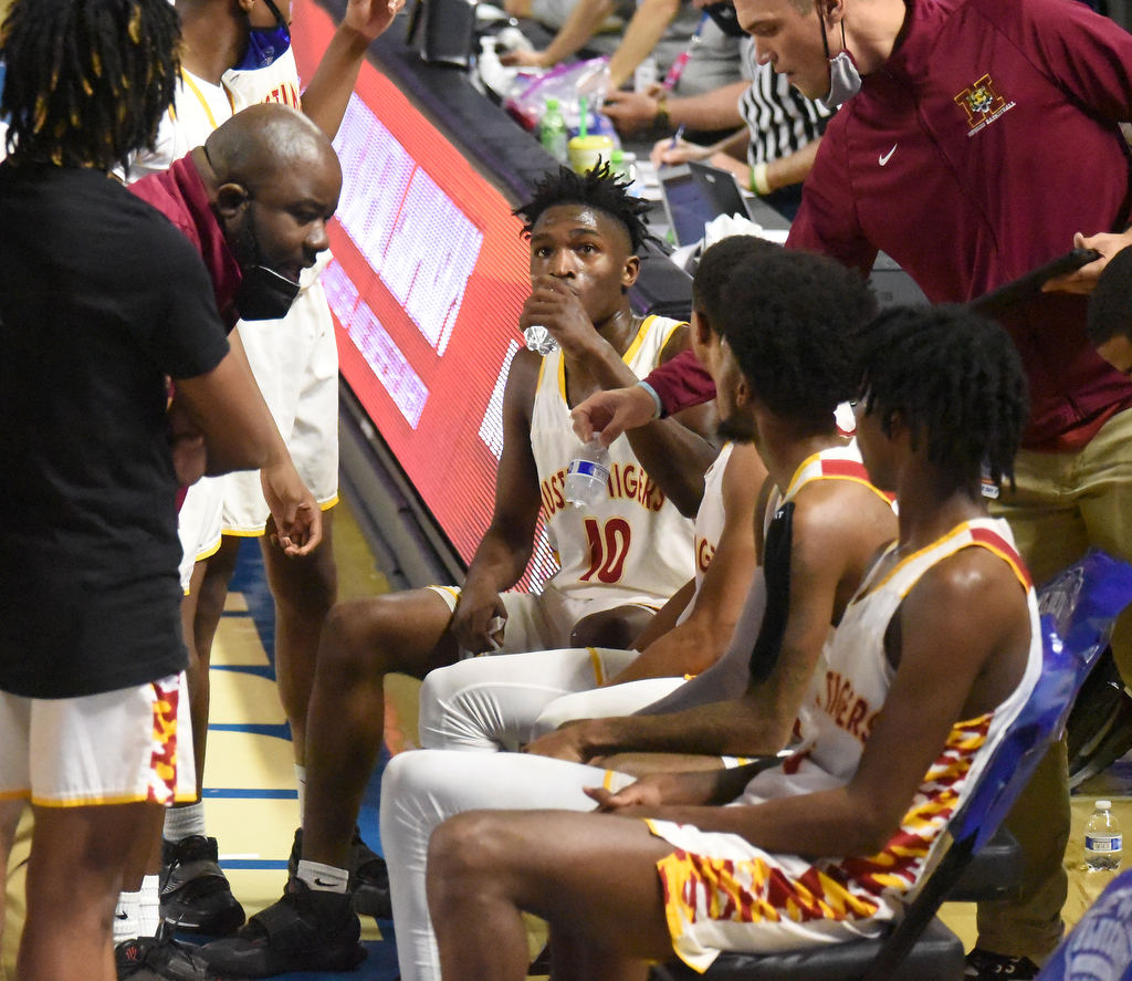 Staff Photo by Matt Hamilton / Howard head coach James Talley talks to his players during a timeout at the Murphy Center in Murfreesboro on Thursday, March 18, 2021.