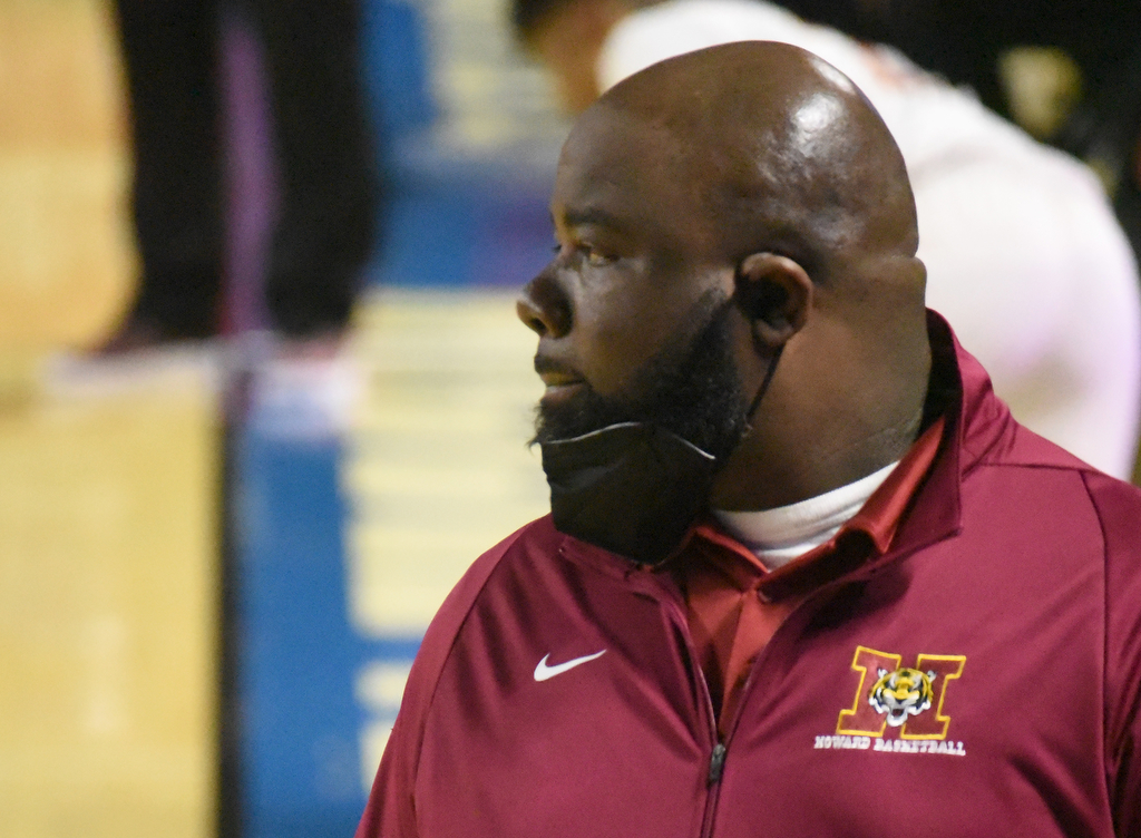 Staff Photo by Matt Hamilton / Howard head coach James Talley watches the action in the second half at the Murphy Center in Murfreesboro on Thursday, March 18, 2021.