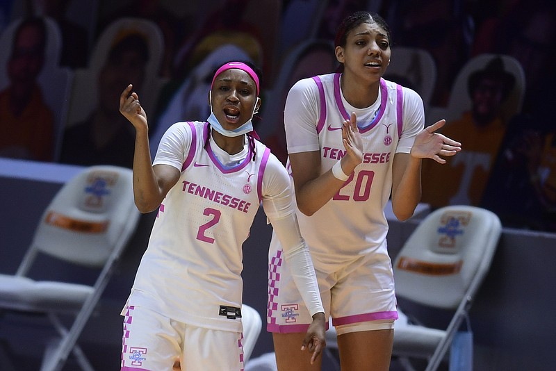 Knoxville News Sentinel photo by Caitie McMekin via AP / Tennessee basketball players Destiny Salary (2) and Tamari Key cheer from the sideline during a home win against South Carolina on Feb. 18.