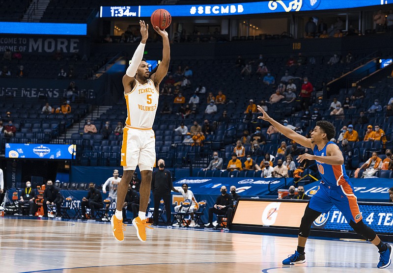 Southeastern Conference photo / Tennessee's Josiah-Jordan James shoots over Florida's Noah Locke during the 78-66 victory by the Volunteers in the quarterfinals of last weekend's SEC tournament in Nashville. That would serve as Tennessee's last win of an 18-9 season.