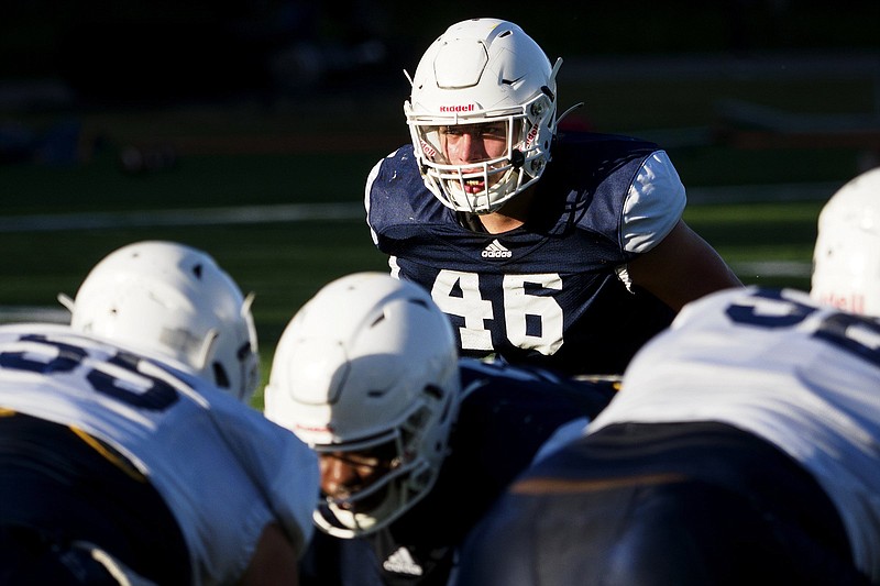 Staff file photo by C.B. Schmelter / UTC linebacker Ty Boeck (46) had eight tackles to help the Mocs to a 20-18 win in SoCon football Saturday at Furman.