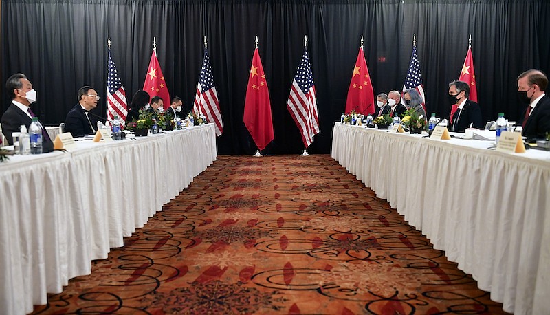 In this March 18, 2021, file photo, Secretary of State Antony Blinken, second from right, joined by national security adviser Jake Sullivan, right, speaks while facing Chinese Communist Party foreign affairs chief Yang Jiechi, second from left, and China's State Councilor Wang Yi, left, at the opening session of U.S.-China talks at the Captain Cook Hotel in Anchorage, Alaska. China said Friday, March 19, 2021, a "strong smell of gunpowder and drama" resulted from talks with top American diplomats in Alaska, continuing the contentious tone of the first face-to-face meetings under the Biden administration. (Frederic J. Brown/Pool Photo via AP, File)