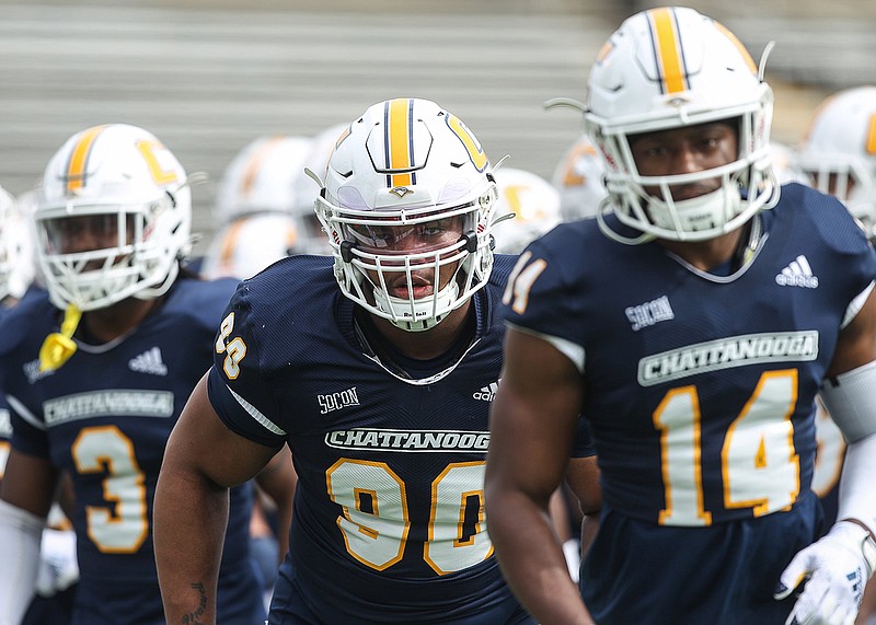 Staff file photo by Troy Stolt / UTC defensive end Devonnsha Maxwell (90) has five sacks through four games this season, and he has helped the Mocs start SoCon play 3-0.