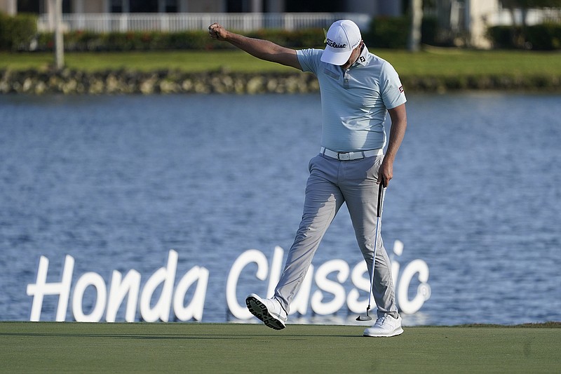 AP photo by Marta Lavandier / Matt Jones raises his fist after winning the PGA Tour's Honda Classic by five strokes on Sunday in Palm Beach Gardens, Fla.