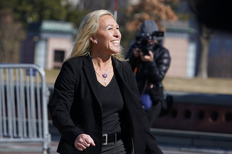 In this Feb. 5, 2021 file photo, Rep. Marjorie Taylor Greene, R-Ga., arrives to speak at a news conference on Capitol Hill in Washington. (AP Photo/Susan Walsh, File)