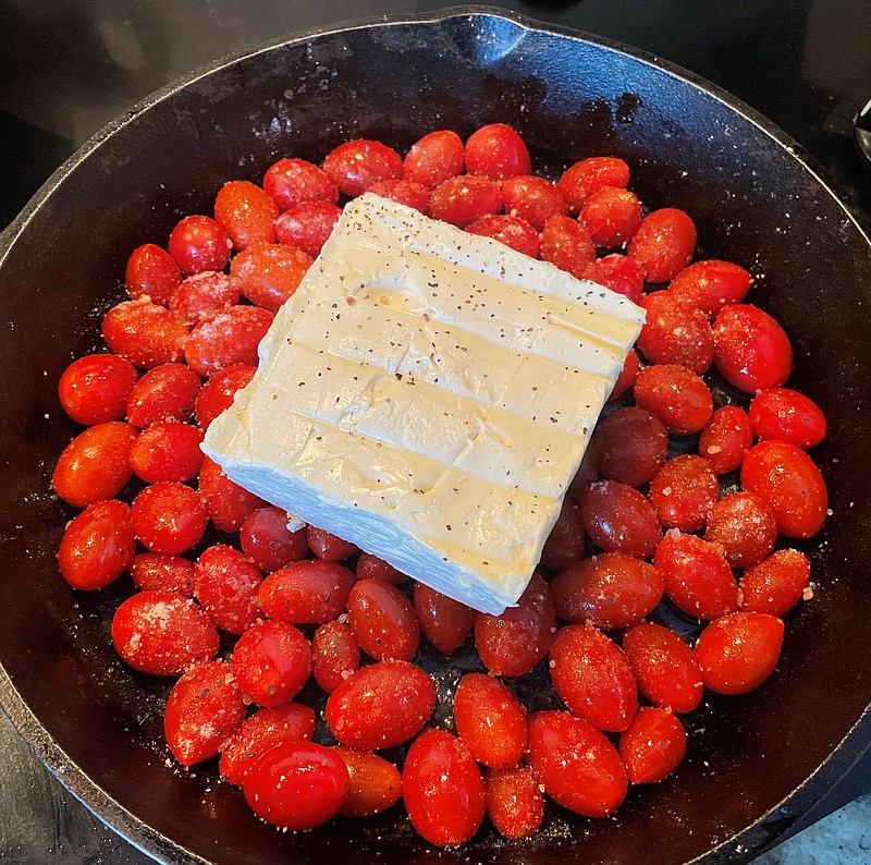 Photo by Anne Braly / The popular TikTok Pasta dish starts with a couple of pints of cherry tomatoes and a block of feta cheese.