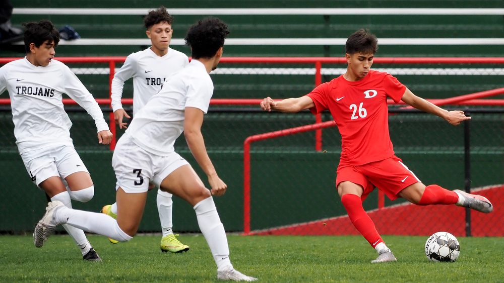 Staff photo by C.B. Schmelter / Dalton's Pablo Castillo (26) takes a shot on goal against Carrollton on Harmon Field at Bill Chappell Stadium on Tuesday, March 23, 2021 in Dalton, Ga.