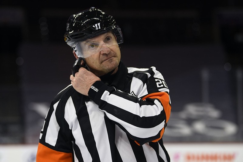 AP file photo by Derik Hamilton / The NHL announced Wednesday that referee Tim Peel will no longer be allowed to work league games due to his comment during the Detroit at Nashville game Tuesday.
