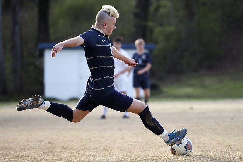 Staff photo by C.B. Schmelter / Soddy-Daisy's Jensen Harbaugh controls the ball against Temple on Friday. Soddy-Daisy won 4-0 to kick off its Trojan Invitational, a 14-team event.