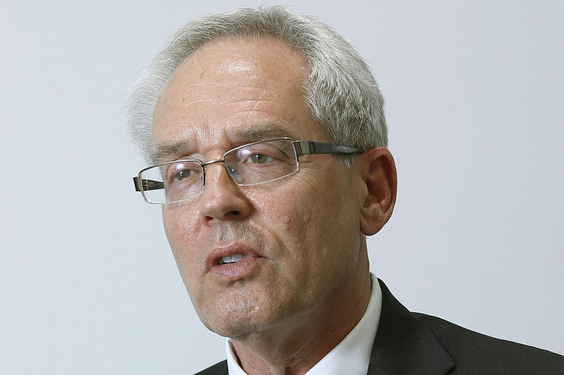 FILE - In this Sept. 8, 2020, file photo, former Nissan Motor Co.'s executive Greg Kelly speaks during an interview in Tokyo. The trial of former Nissan executive Kelly in a Tokyo court is increasingly focusing on a rift between Nissan Motor Co. and its French alliance partner. (Kyodo News via AP, File)