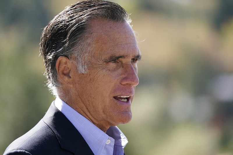 FILE - In this Oct. 15, 2020 file photo, Sen. Mitt Romney, R-Utah, speaks during a news conference near Neffs Canyon, in Salt Lake City.  (AP Photo/Rick Bowmer, File)


