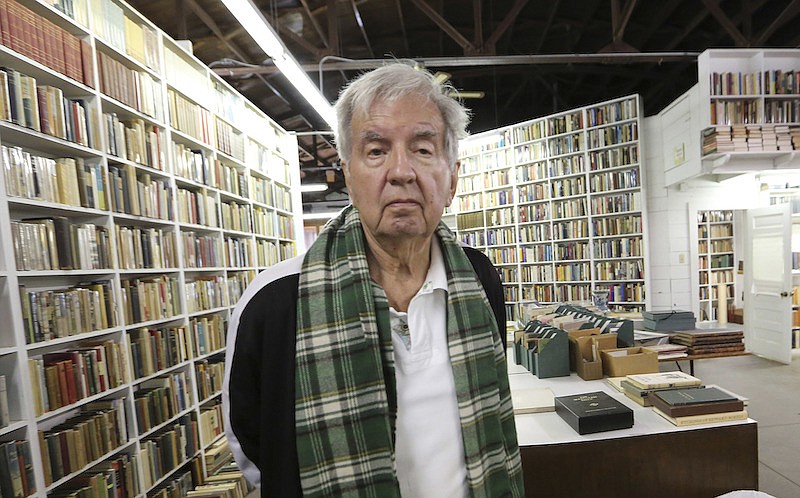 In this April 30, 2014, file photo, Pulitzer Prize-winning author Larry McMurtry poses at his book store in Archer City, Texas. McMurtry has died at the age of 84. His death was confirmed Friday, March 26, 2021, by a spokesman for his publisher Liveright. Several of McMurtry's books became feature films, including the Oscar-winning films "The Last Picture Show" and "Terms of Endearment." He also co-wrote the Oscar-winning screenplay for "Brokeback Mountain." (AP Photo/LM Otero, File)