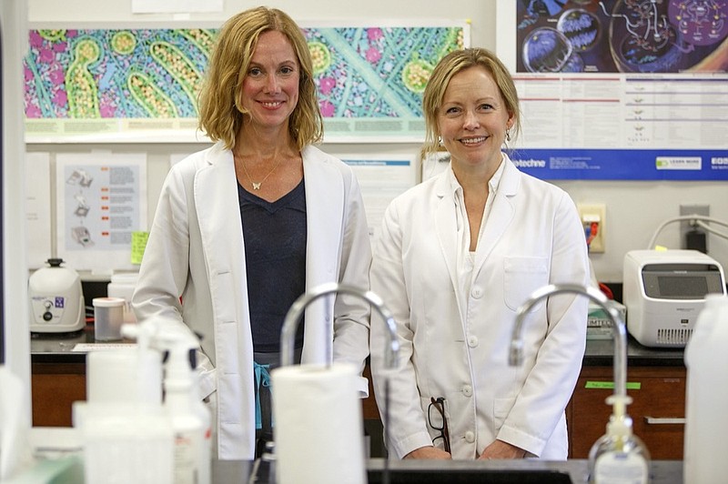 Staff photo by C.B. Schmelter / Dr. Elizabeth Forrester, left, and Dr. Dawn Richards pose at the Baylor Esoteric and Molecular Laboratory in the Weeks Science Building on the campus of Baylor School on Friday, July 17, 2020 in Chattanooga, Tenn.