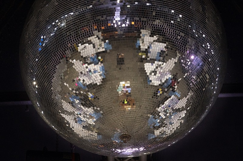 Reflected on a mirror ball, health workers have a coronavirus test ahead of a music concert in Barcelona, Spain, Saturday, March 27, 2021. (AP Photo/Emilio Morenatti)


