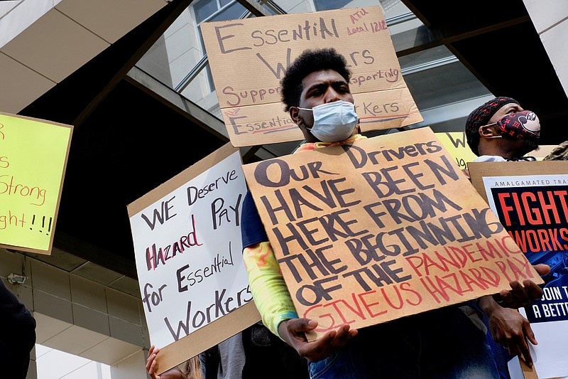 Staff photo by Wyatt Massey / Elijah Locklin, 21, stands during a rally for CARTA to reinstate hazard pay for its drivers. The gathering was held on Market Street on March 28, 2021.