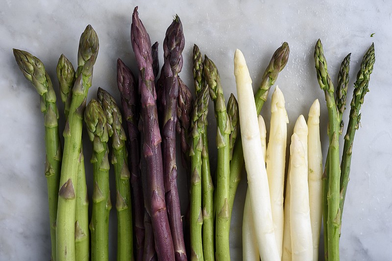 The many varieties of asparagus can be served raw, steamed, boiled, sauteed, roasted, stir-fried, deep-fried, pureed for soup or a dip, and baked in custards, tarts and souffles. / File Photo by Karsten Moran/The New York Times