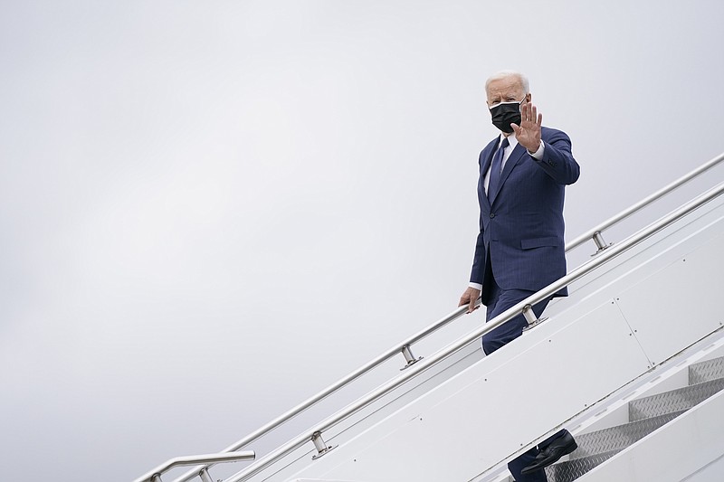Photo buy Evan Vucci of The Associated Press / President Joe Biden arrives at Pittsburgh International Airport ahead of a speech on infrastructure spending on Wednesday, March 31, 2021, in Pittsburgh, Pennsylvania.