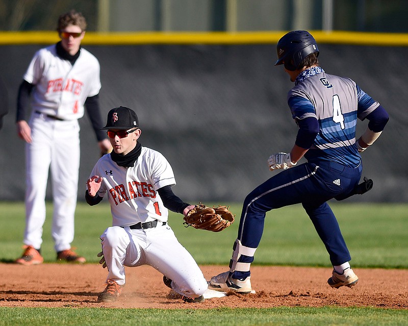 Staff Photo by Robin Rudd /  Gordon Lee's Brody Cobb (4) is safe at second, while South Pittsburg shortop Luke Rector (1) takes the throw.  The Gordon Lee Trojans faced the South Pittsburg Pirates in the Lookout Valley Classic, at Lookout Valley High School, on April 1, 2021.  