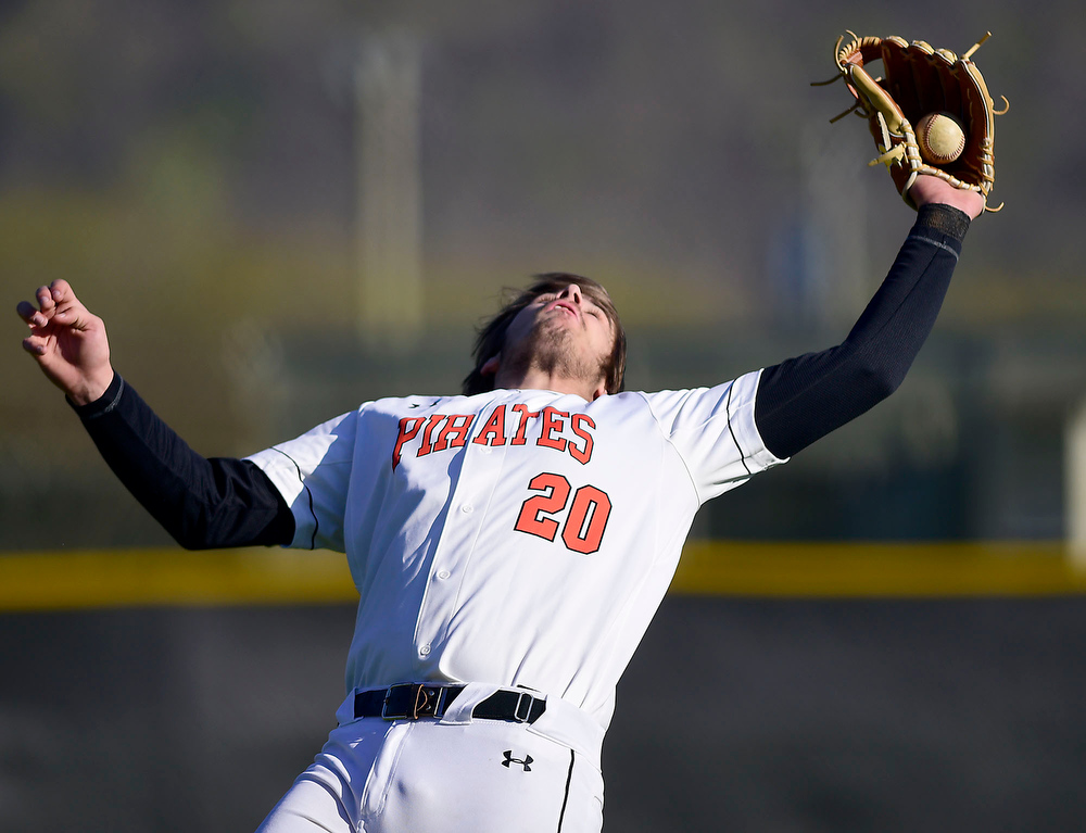 Staff Photo by Robin Rudd / South Pittsburg pitcher Ryan Cagle (20) makes a difficult catch on a pop up. The Gordon Lee Trojans faced the South Pittsburg Pirates in the Lookout Valley Classic, at Lookout Valley High School, on April 1, 2021.