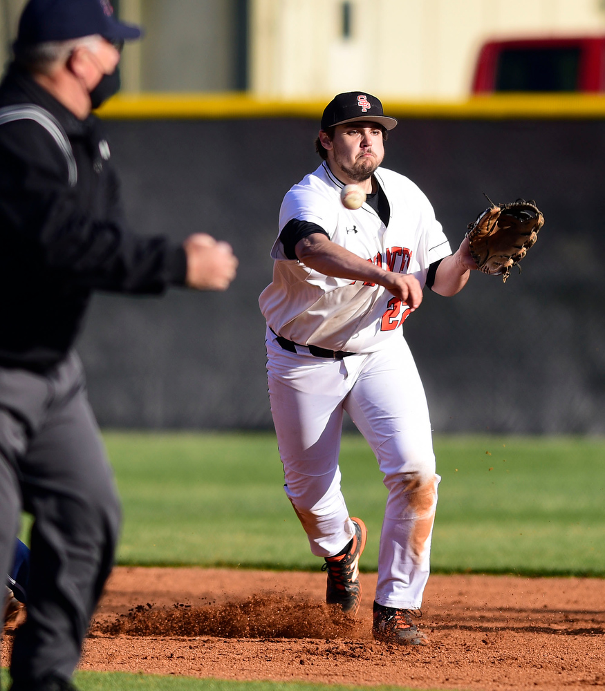 Staff Photo by Robin Rudd / South Pittsburg second baseman Javen Talley (22) throws to first for a double play. The Gordon Lee Trojans faced the South Pittsburg Pirates in the Lookout Valley Classic, at Lookout Valley High School, on April 1, 2021.