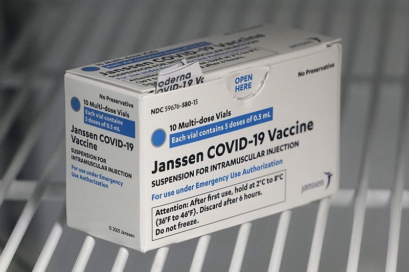 FILE - In this March 25, 2021 file photo, a box of the Johnson & Johnson COVID-19 vaccine is shown in a refrigerator at a clinic in Washington state. A batch of Johnson & Johnson's COVID-19 vaccine failed quality standards and can't be used, the drug giant said late Wednesday, March 31, 2021. The drugmaker didn't say how many doses were lost, and it wasn't clear how the problem would impact future deliveries. (AP Photo/Ted S. Warren)