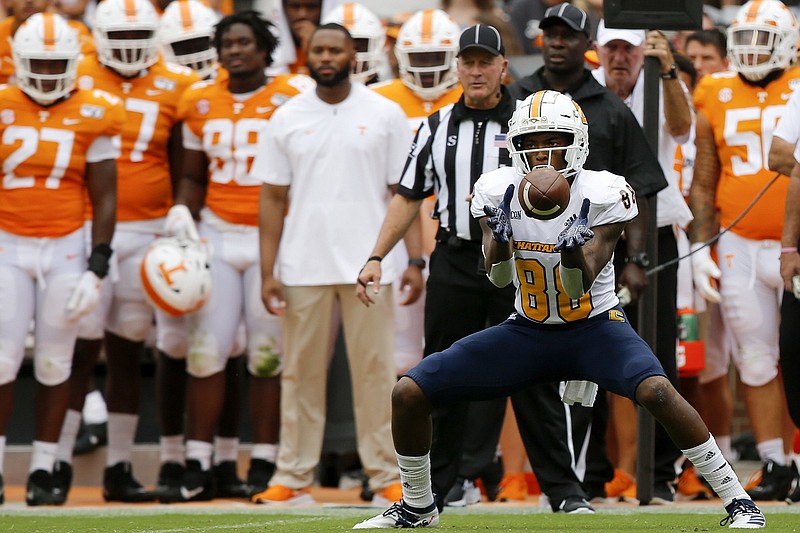 Staff photo by C.B. Schmelter / UTC's Juwan Tyus catches a pass at Tennessee on Sept. 14, 2019. Tyus has played both wide receiver and tight end during his time with the Mocs, and this spring he had a 76-yard touchdown catch against The Citadel.