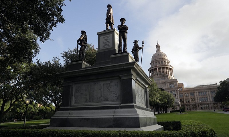 FILE - In this Aug. 21, 2017 file photo, the Texas State Capitol Confederate Monument stands on the south lawn in Austin, Texas. (AP Photo/Eric Gay, File)


