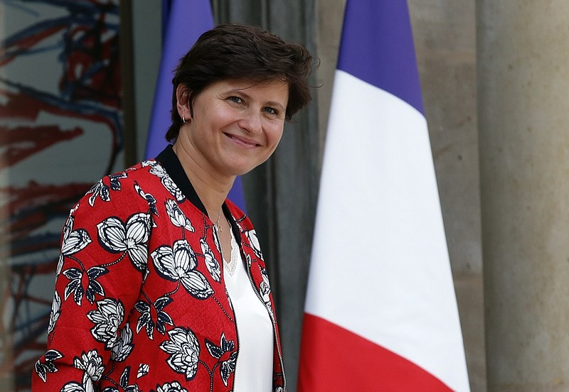 FILE - In this Wednesday, Sept. 5, 2018 file photo, French Sports Minister Roxana Maracineanu leaves the Elysee Palace after the weekly cabinet meeting, in Paris. (AP Photo/Christophe Ena, File)


