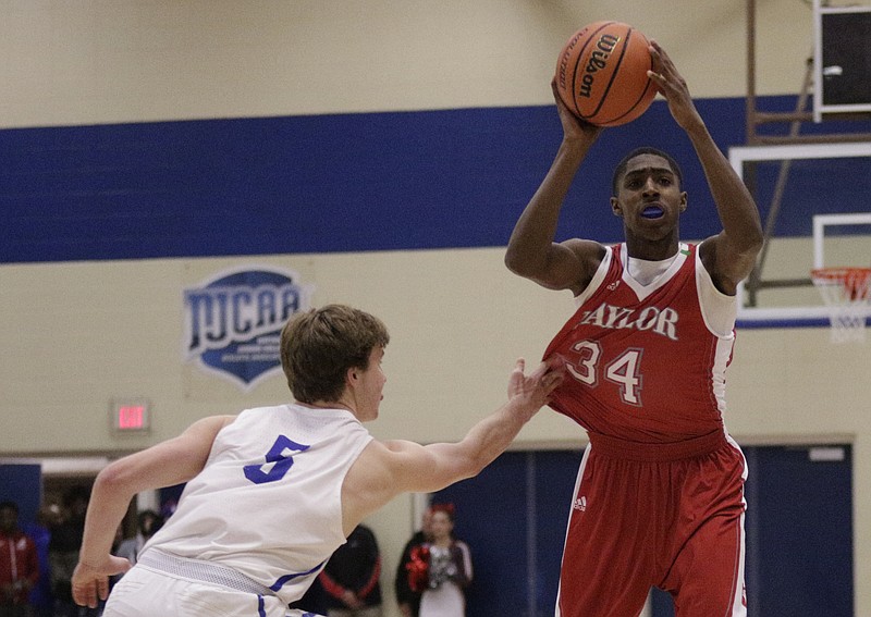 Baylor's Randy Brady passes away from McCallie's Trip Butler during their Times Free Press Best of Preps basketball tournament championship game at Chattanooga State Technical Community College on Saturday, Dec. 30, 2017, in Chattanooga, Tenn.