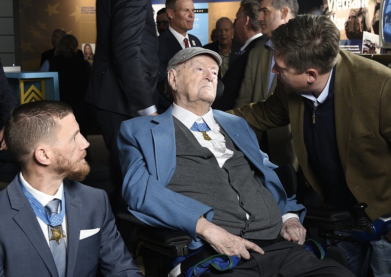 Staff Photo by Robin Rudd / J.C. Coolidge, right, Mr. Coolidge's grandson, introduces Charles Coolidge to Kyle Carpenter, the youngest Medal of Honor recipient present at the dedication. The Charles H. Coolidge National of Medal of Honor Heritage Center was dedicated during a ceremony at the center on Saturday, February 22, 2020.