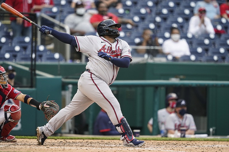 AP photo by Alex Brandon / Atlanta Braves pinch hitter Pablo Sandoval watches his two-run homer during the seventh inning of Wednesday's second game against the host Washington Nationals. The Braves won 2-0 after taking the day's first game 7-6.