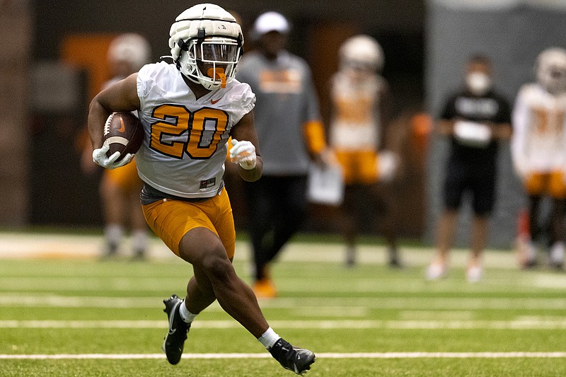 Tennessee Athletics photo by Andrew Ferguson / Tennessee sophomore running back Jabari Small goes through a drill earlier this spring inside the Anderson Training Center.