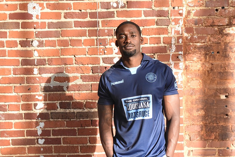 Photo contributed by Chattanooga FC / Shaun Russell, a defender for CFC, models the pro soccer team's new jersey with The Original Louisiana Brand Hot Sauce logo.