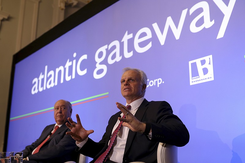 FILE - In this June 24, 2015 file photo, American-Brazilian businessman David Neeleman, right, talks to journalists during a joint news conference with his partner Portuguese businessman Humberto Pedrosa, in Lisbon. Two new U.S. airlines are planning on starting service this spring, tapping into the travel recovery that is picking up speed. Breeze Airways is the latest creation of Neeleman, who founded JetBlue Airways more than 20 years ago. (AP Photo/Francisco Seco, File)