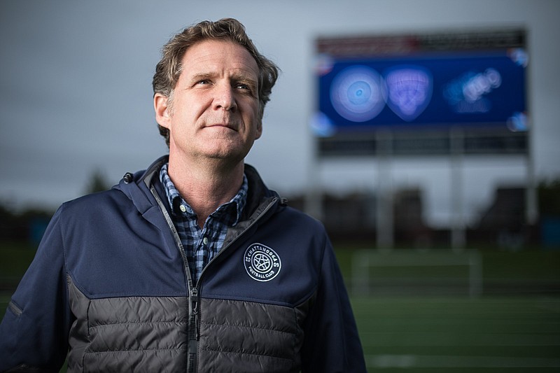 Staff photo by Troy Stolt / Chattanooga Mayoral candidate Tim Kelly poses for a portrait inside Finley Stadium at midfield on Wednesday, March 31.