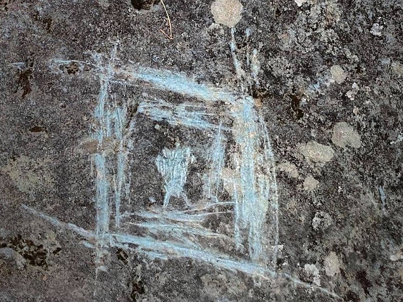 In an undated image provided by the U.S. Forest Service, petroglyphs on the boulders at Track Rock Gap in the Chattahoochee National Forest in Union County, Ga., were vandalized. Rock faces and boulders bearing figure carvings called petroglyphs were scratched or dabbed with paint, the United States Forest Service said. (U.S. Forest Service via The New York Times) — FOR EDITORIAL USE ONLY. —