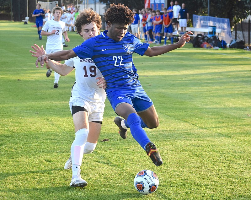 Staff photo by Patrick MacCoon / McCallie junior Daniel Anderson speeds to the goal line to try to keep the play alive during Friday's 2-0 home victory over Bearden.